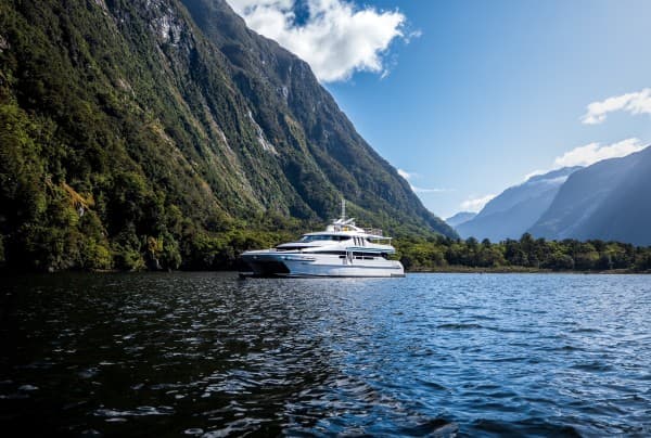 Boat exploring Milford Sound