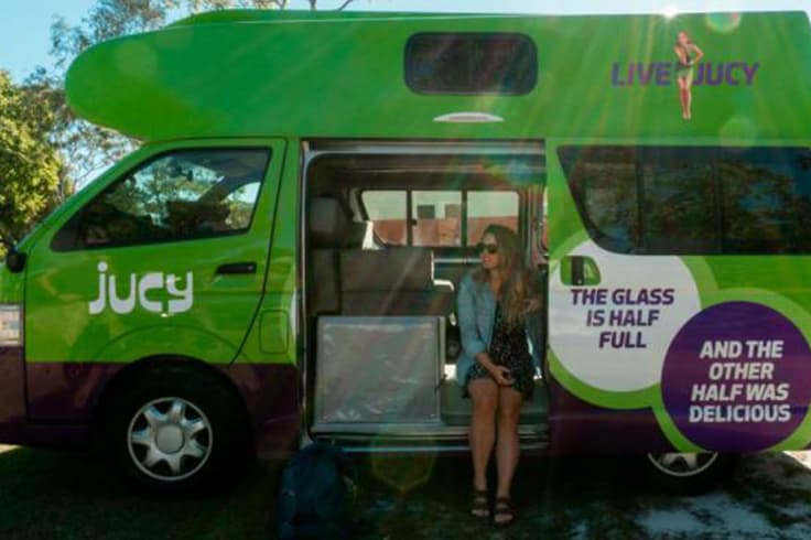 5 easy road trips out of sydney 1 Girl sitting in a JUCY campervan