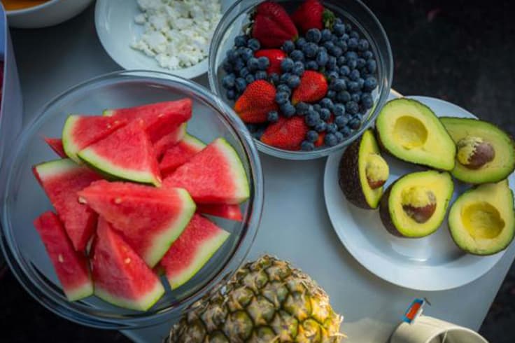 travelling australia in a campervan 2 A selection of fruit and avocados on a camping table